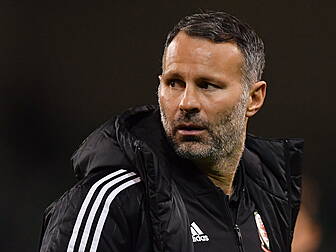 Giggs charged with assaulting...